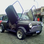 <b>Matte black Mini Cooper with scissor doors</b>